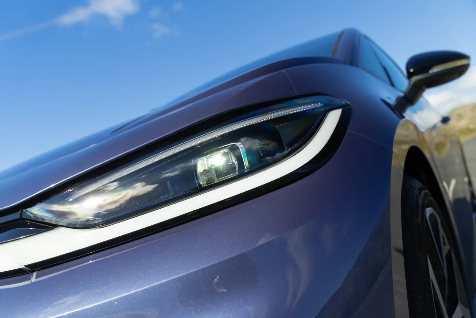Close-up of the Volkswagen ID.3 Neo LED headlight and illuminated front light strip